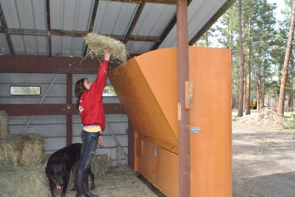 loading hay in the hopper