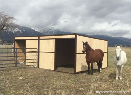 Two finished horse shelter kits